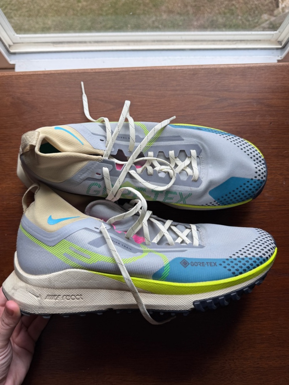 Nike Light Gray Running Shoes with Blue, Pink & Yellow Accents
